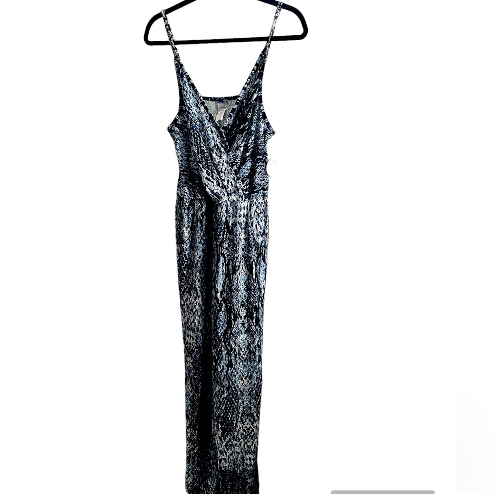 NWT Swimsuits For All jumpsuit coverup. Stretchy material. Size 10/12